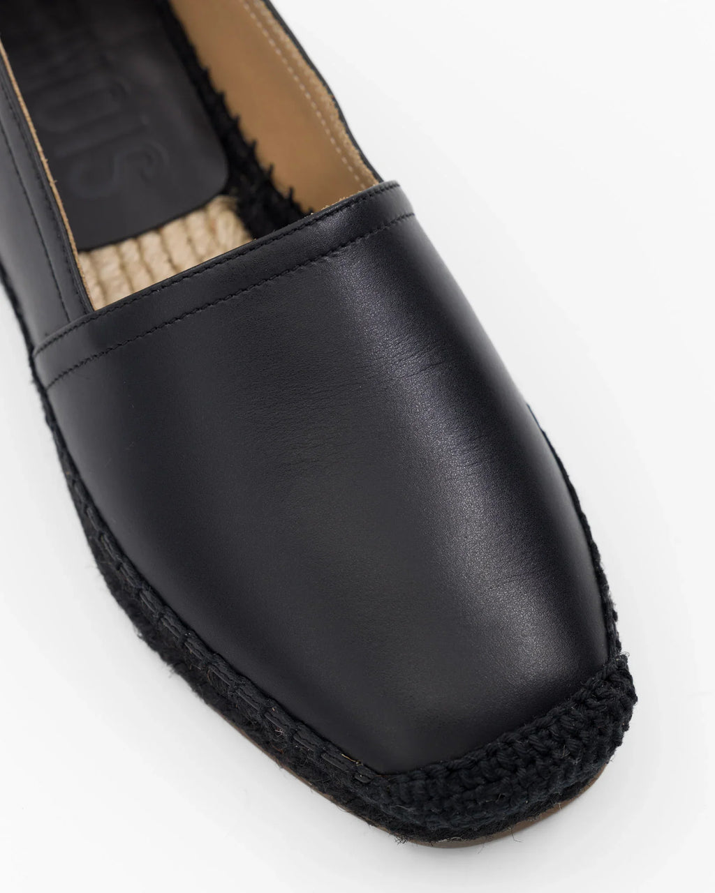 Scarpe nere in pelle con suola intrecciata, stile espadrille elegante e comodo