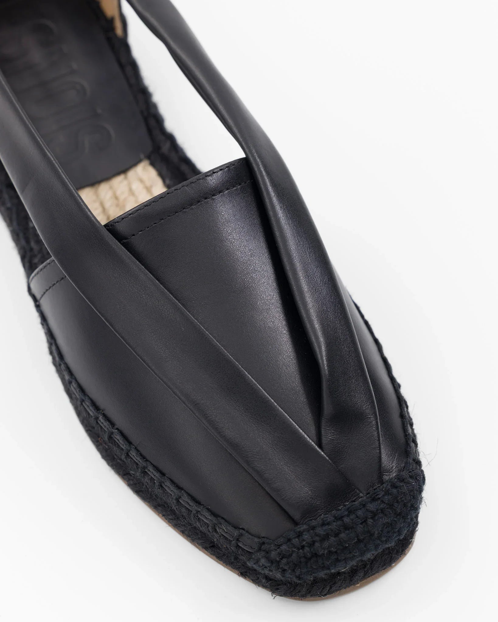 Black leather espadrille with woven jute sole and sleek design